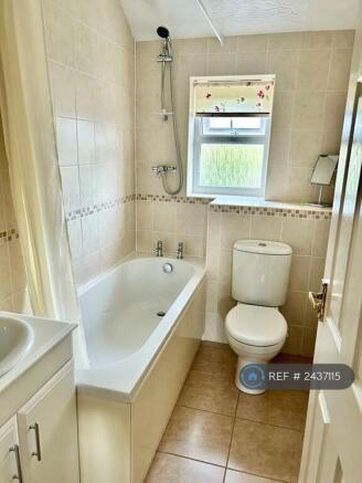 Bathroom With Triton Shower Above