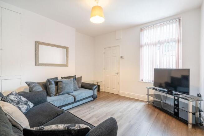 Bright and welcoming living room featuring two ...