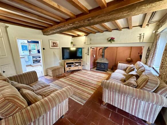 lounge with woodburner.JPEG