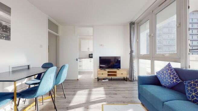 Bright modern lounge with stylish dining area...