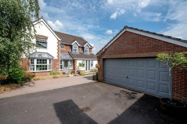 Double garage and wide driveway