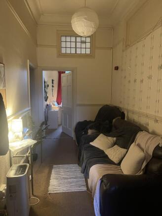 Cozy furnished living room with a comfy leather...