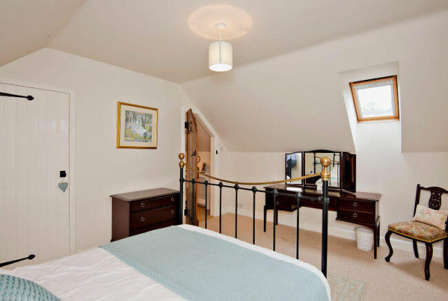 Bedroom 3 with fitted wardrobe.