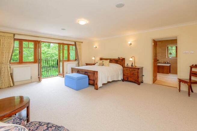 Bedroom With Balcony
