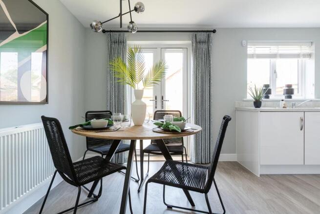 Double doors in the kitchen diner open out to the garden