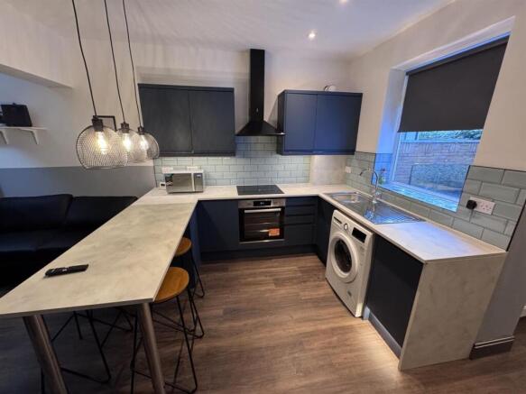 Modern kitchen with stylish breakfast bar...