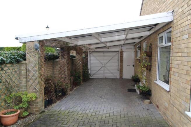 CARPORT WITH GARAGE OPENING