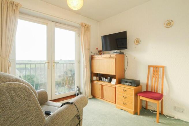 BEDROOM/SITTING ROOM
