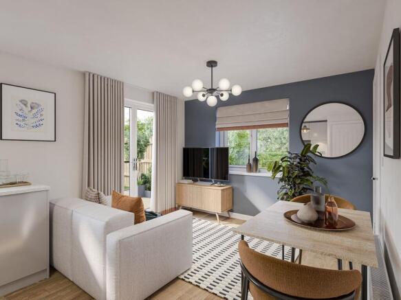 An open-plan lounge/dining space includes double doors that to the garden