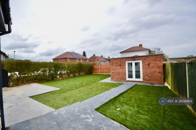 Garden And Outhouse