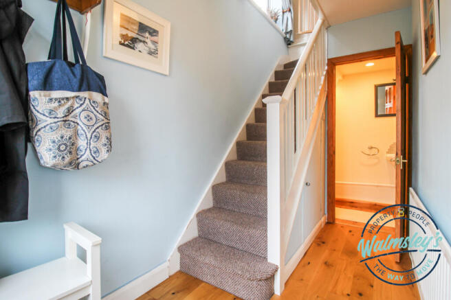 Welcoming hallway with cloakroom
