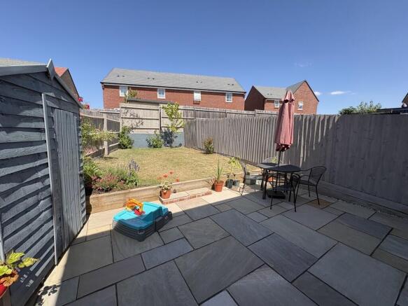 Rear gdn from sid...