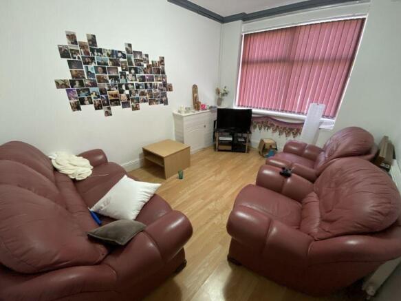 Social living area with plush leather seating...