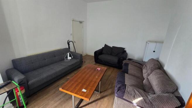 Spacious living room with comfortable seating...