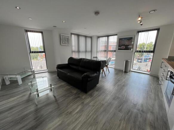 Bright open-plan living with stylish flooring...