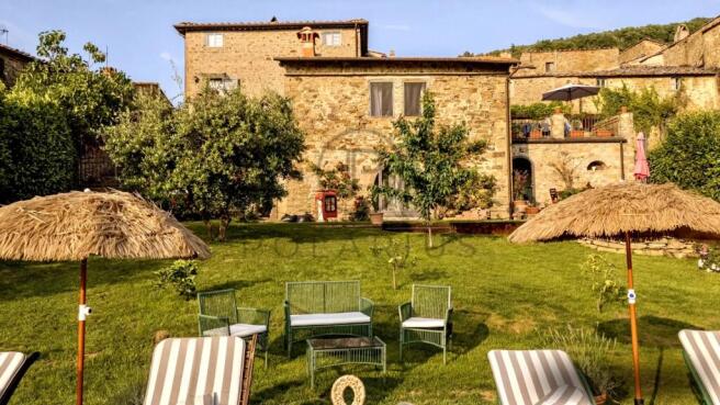 Charming hillside villa with a lush garden and out