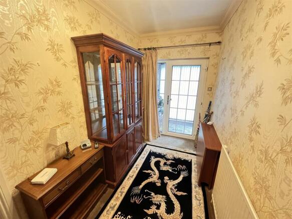 FRONT RECEPTION VESTIBULE to HALLWAY
