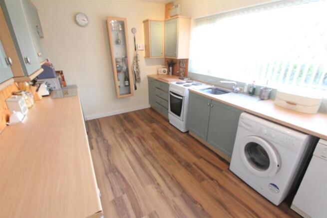 Fitted kitchen to front