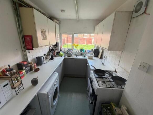 Bright functional kitchen with garden views...