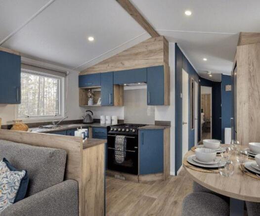 Modern Blue Kitchen And Dining Area In The Willerb