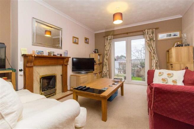 THROUGH LOUNGE & DINING ROOM