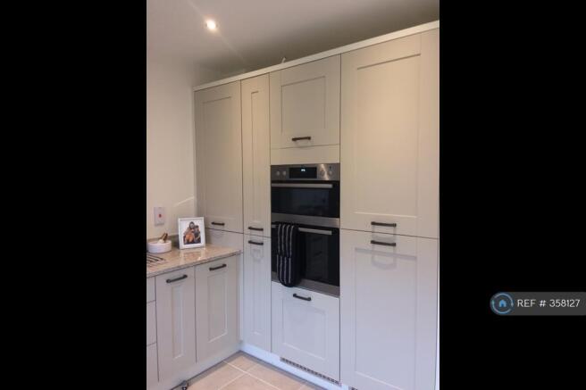 2 Ovens And An Integrated Fridge And Freezer