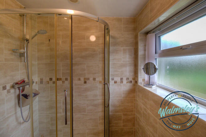 1st floor fully tiled shower room
