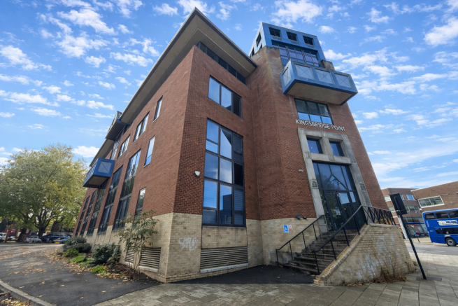 Kingsbridge Point under a blue sky.png