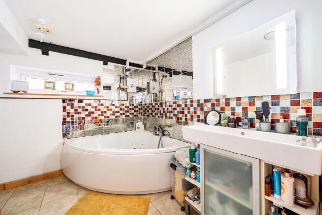 BATHROOM with SHOWER over the bath.jpg