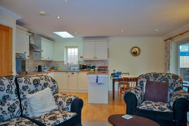 OPEN PLAN LIVING ROOM AND KITCHEN
