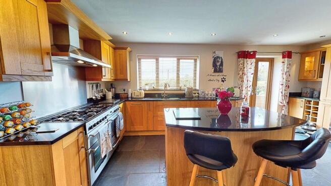 THROUGH KITCHEN/DINING/FAMILY ROOM