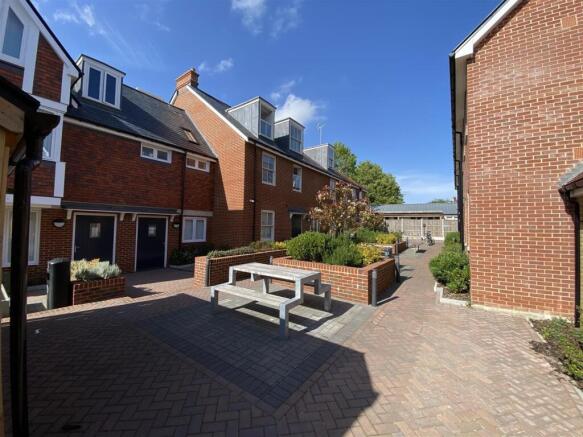 Beautiful sunny courtyard with seating area...