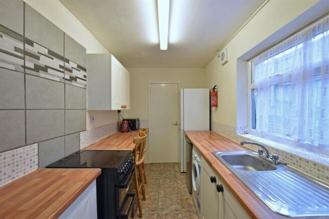 Clean kitchen with ample counter space...