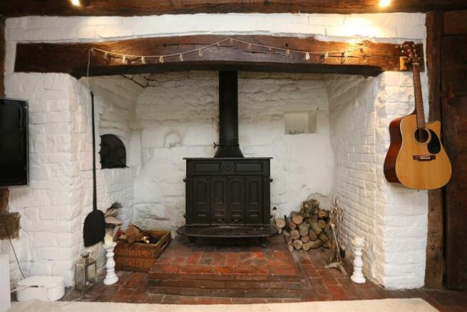 1 Septima Cottages Fireplace.JPG