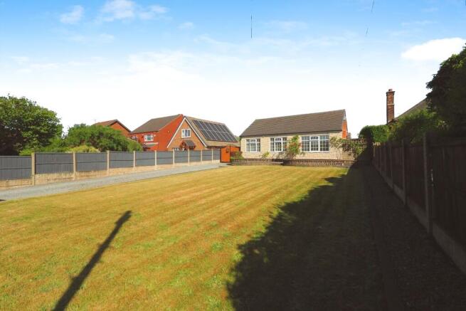 Impressive Garden and Driveway to the front