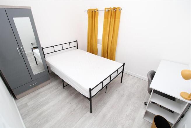 Bright modern bedroom with stylish furniture...