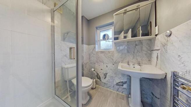 EN-SUITE SHOWER ROOM