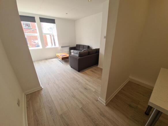 Bright and welcoming living room with a comfort...