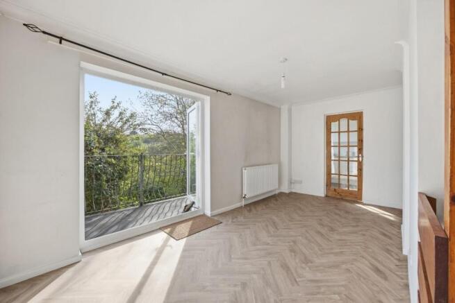 Dining Room with Balcony