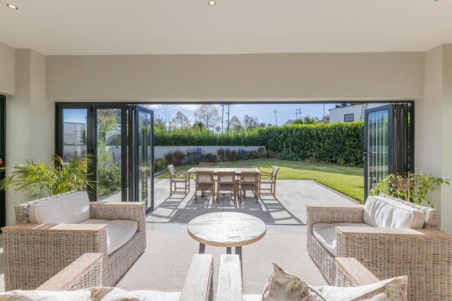 Sunroom opening onto an open patio