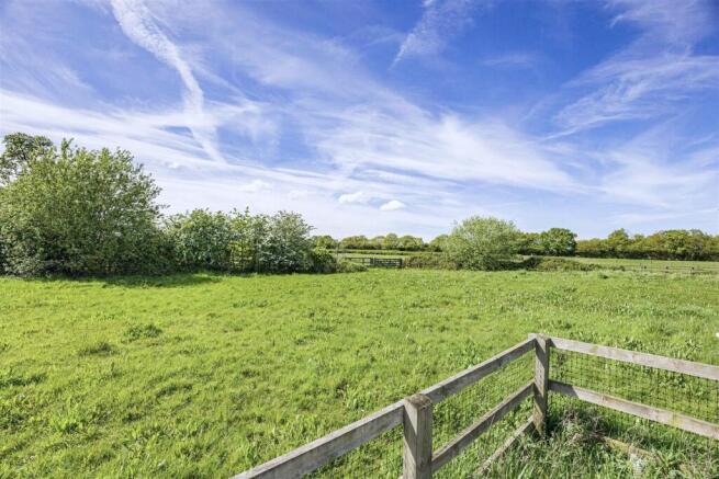 Farmyard setting amid fields