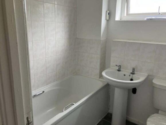 Bathroom Bath with overhead shower