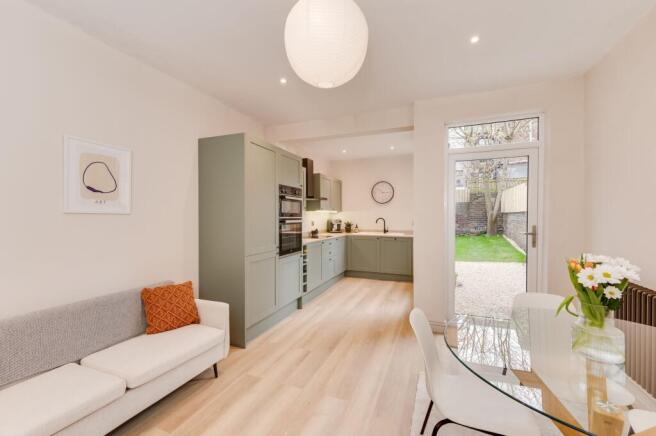 BAYED SITTING ROOM DINING WITH OPEN PLAN KITCHEN