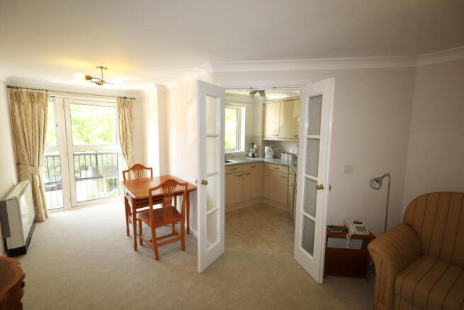 Sitting room through to kitchen