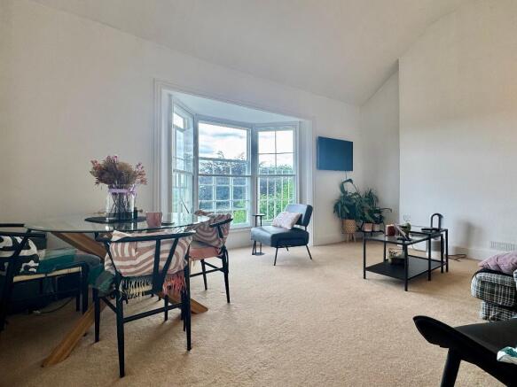 Sitting room with bay window and views