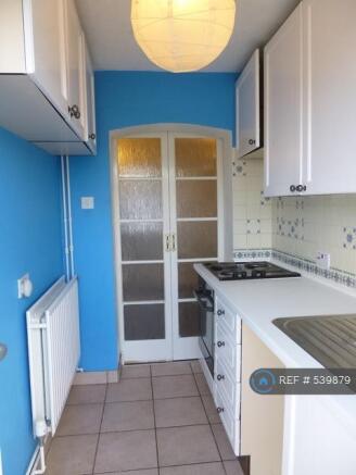 Kitchen & Door To Lounge