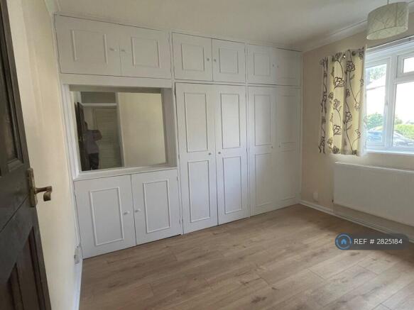 Bedroom With Built In Cupboards
