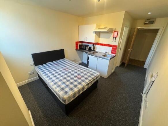 A compact but functional student kitchen area f...