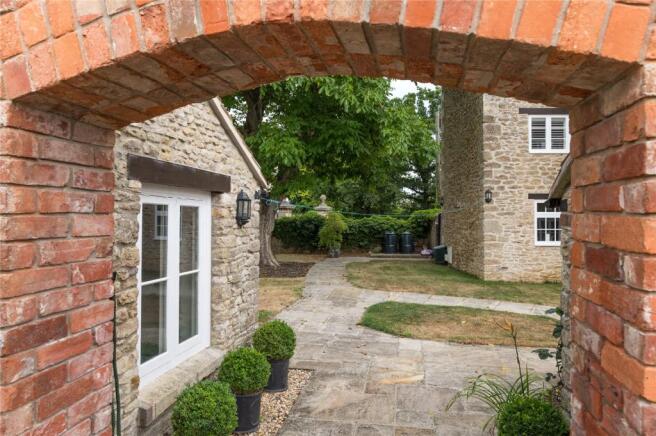 Archway To Garden