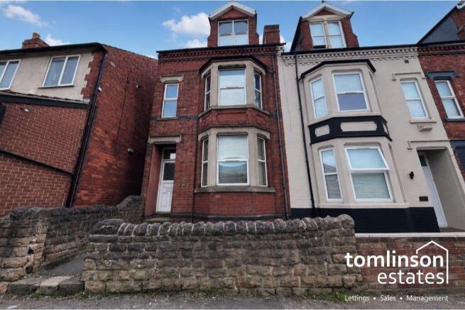 Terraced house with two flats